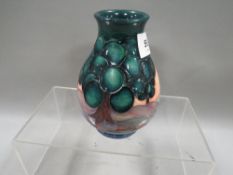 A small Moorcroft squat vase