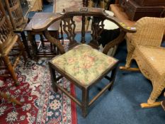 An antique carved oak corner chair A/F