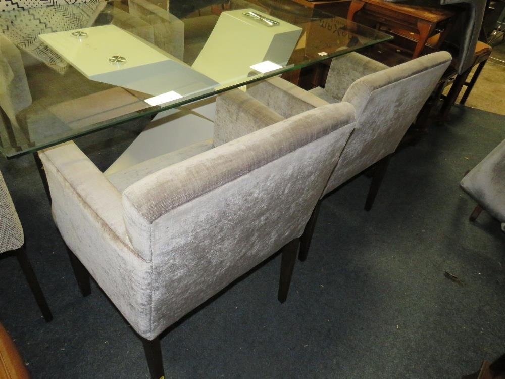 A modern glass topped dining table together with four armchairs - Image 3 of 6