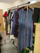 A collection of assorted vintage clothing, various styles and periods including 1960s, 1970s etc.,
