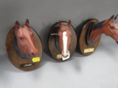 Three Beswick racehorse wall plaques