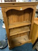A modern open honey pine bookcase W 89 cm