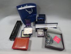 A tray of costume jewellery to include Swarovski crystal