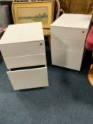 Two modern metal 3 drawer filing cabinets on castors