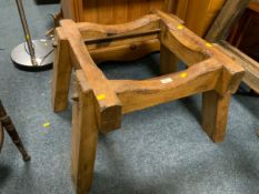 A vintage wooden barrel holder stamped GWR