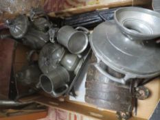 A tray of assorted metal ware and treen to include a barrel, and a carved hardwood figure