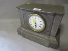 A slate mantel clock