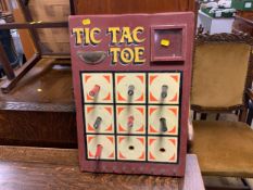 A vintage tic-tac-toe pub game board
