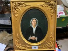 A 19th century oil on canvas portrait of a lady in gilt frame