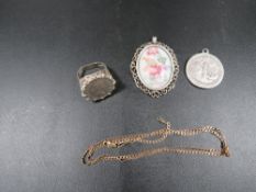 Two pendants on a 375 gold chain approx weight 2.5g together with a silver ring