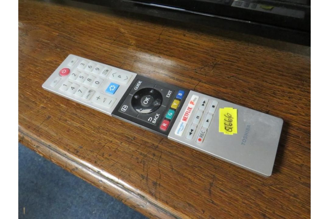 A Toshiba 50 inch flatscreen television with remote - Image 5 of 7