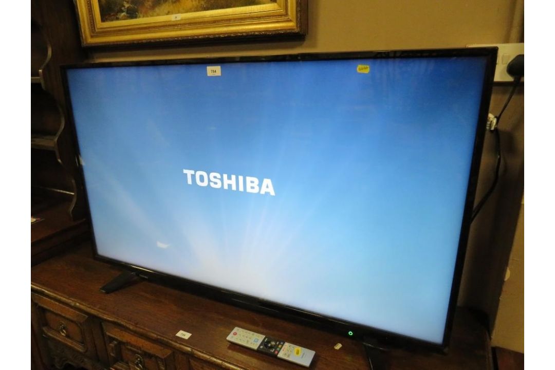 A Toshiba 50 inch flatscreen television with remote - Image 3 of 7