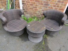A rattan PVC garden patio table and two chair set