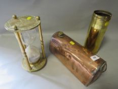 A vintage trench art vase together with a 19th century copper footwarmer and a brass hour glass