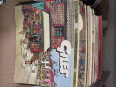 A tray of vintage Giles annuals