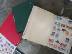 Two albums of world stamps, large quantity of loose stamps, together with two albums of first day
