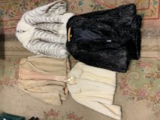 Four assorted vintage faux fur coats comprising an unusual Astraka chevron patterned jacket, an Anne