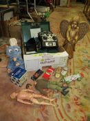 A selection of vintage toys etc., to include Action Man, Dinky toys, a carved wooden angel,