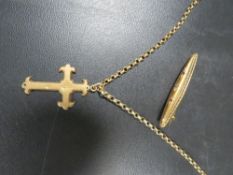 A vintage 9ct cross on yellow metal chain together with a hallmarked 15 carat gold bar brooch