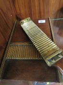 An antique brass mounted pill maker