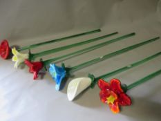 Six large modern glass floral stems