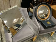 A modern square mirrored stand together with a circular modern mirror and a box