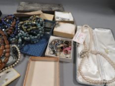 A tray of assorted costume jewellery and watches etc