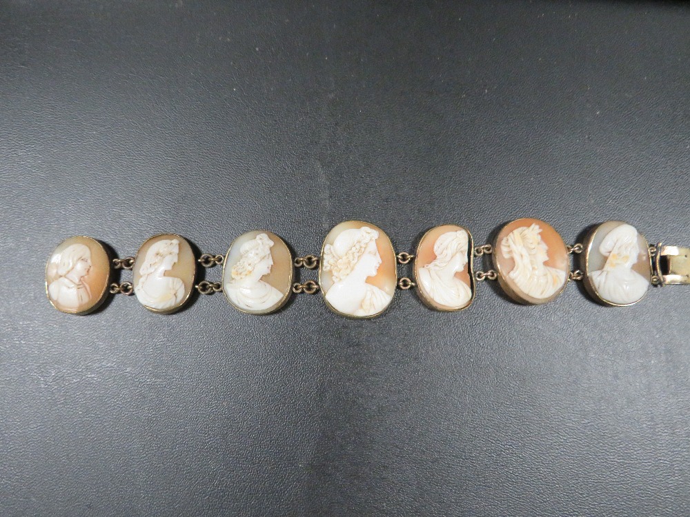 A 19th century seven panel cameo bracelet with gilt metal fittings