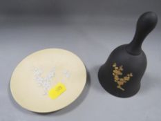 A Wedgwood jasperware black primrose bell and yellow pin dish