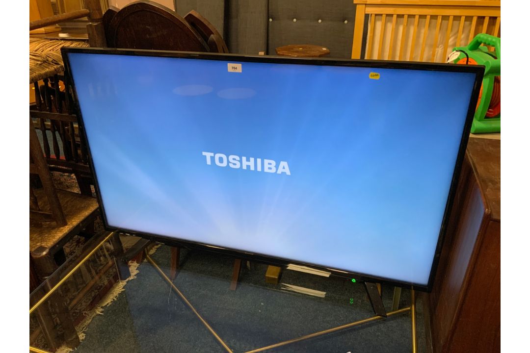 A Toshiba 50 inch flatscreen television with remote - Image 4 of 7