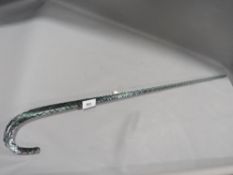 A glass walking cane