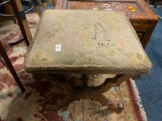 An antique 19th century cross framed tapestry stool