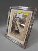 A hallmarked silver photo frame