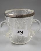 A hallmarked silver rimmed glass tig table striker