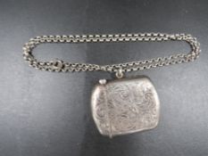 An antique silver vesta case on chain H. M. Birmingham 1915