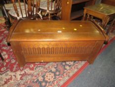 An oak linen fold coffer W 106 cm