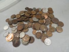 A tub of British and world coins etc