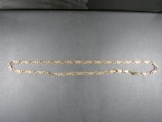 A Hallmarked 9 carat gold flat linked necklace approx weight 15.4g