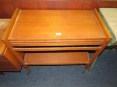 A mid-century teak trolley