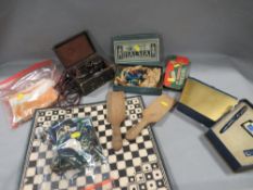 A tray of collectables to include Scout badges and a mathematical set