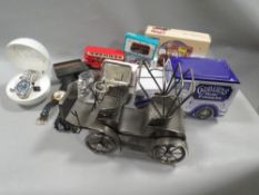 A tray of collectables to include watches. tins etc