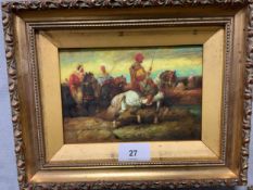 An Eastern oil on board depicting Arab soldiers on horseback