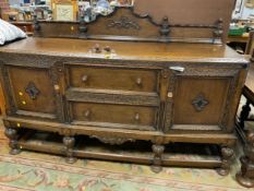 A quality, heavy oak carved sideboard W 182 cm