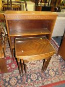 An open oak bookcase together with a nest of glass top tables and two dining chairs