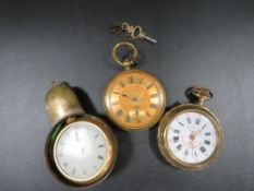 Three vintage brass open faced pocket watches to include one with horse and rider figure to reverse