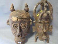 A large African tribal art Senufo Ivory Coast tribal mask and a large Congo Luba helmet mask
