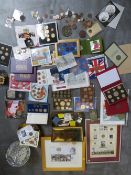 A large quantity of mainly modern commemorative coins in sets, framed and loose, to include UK proof