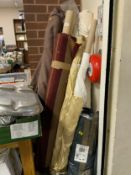 A quantity of assorted fabric on rolls