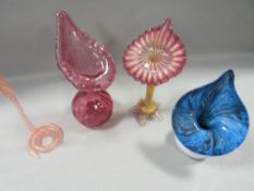 Four pieces of studio glass