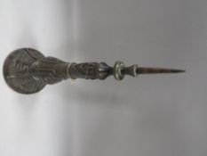 A bronze style Oriental table spike with character mark to base